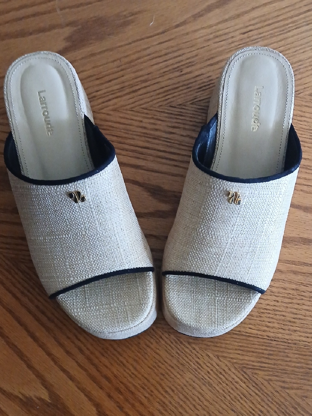 Larroude Cream Slide Mules with Black Trim